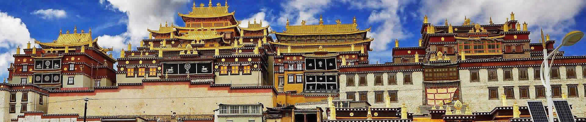 Shangri-La is a fictional place described in the 1933 novel Lost Horizon by British author James Hilton. Hilton describes Shangri-La as a mystical, harmonious valley, gently guided from a lamasery, enclosed in the western end of the Kunlun Mountains. Shangri-La has become synonymous with any earthly paradise, particularly a mythical Himalayan utopia – a permanently happy land, isolated from the world. 