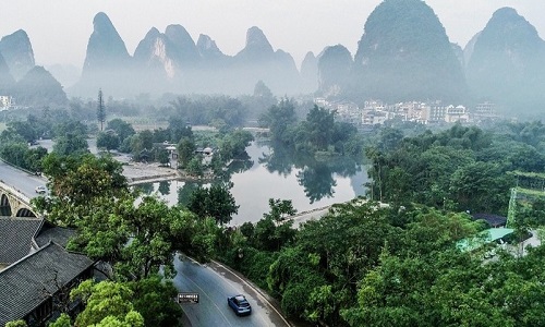 4-Day Yangshuo Overnight Tours: Bamboo Rafts, Mountain Views & Heritage Hands-On